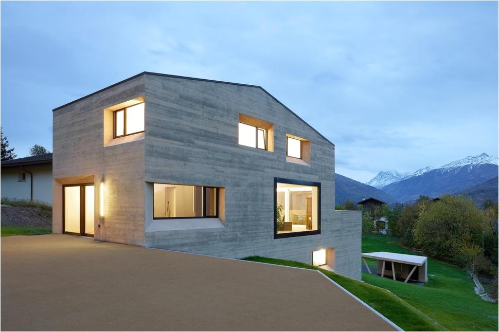 hillside house with wood look concrete covering