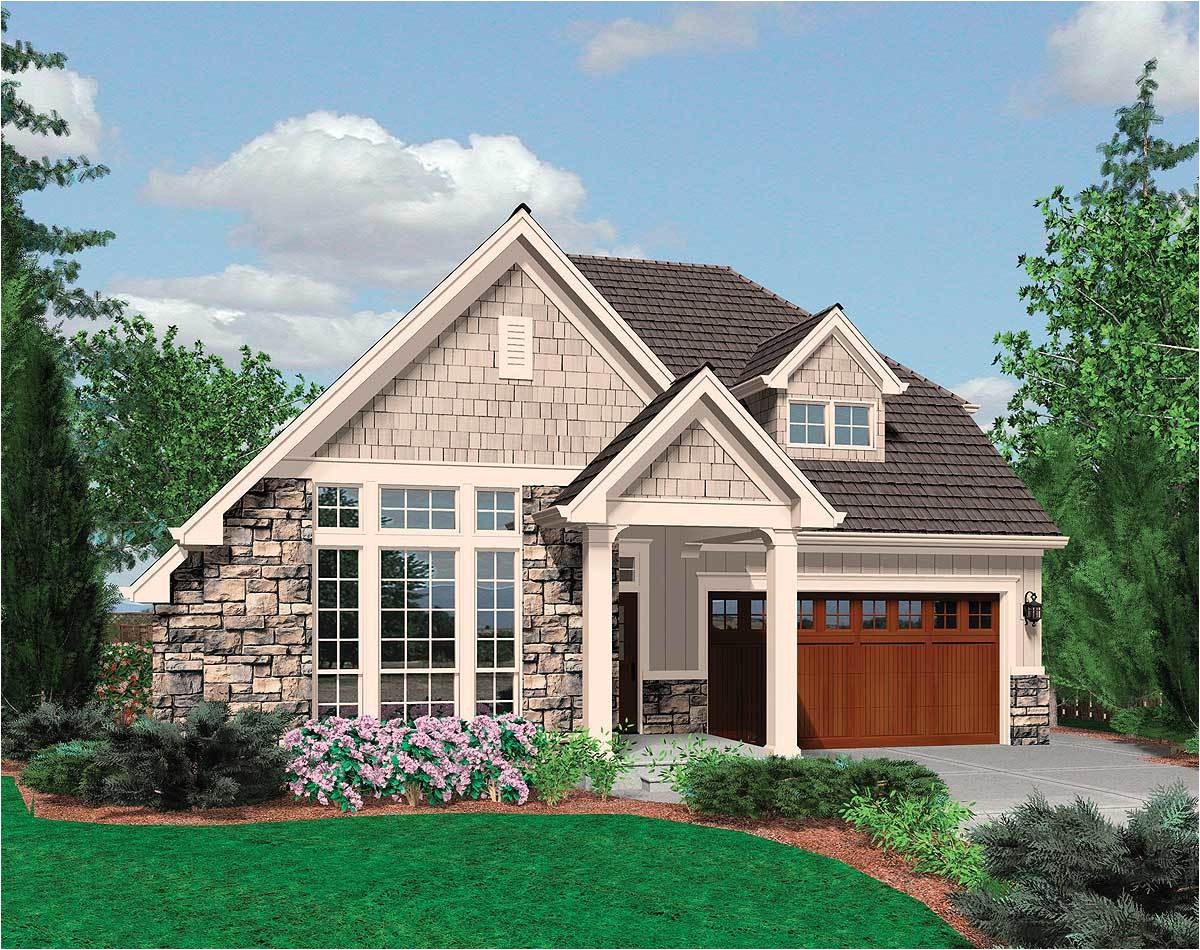small family cottage plan with vaulted ceilings 69125am