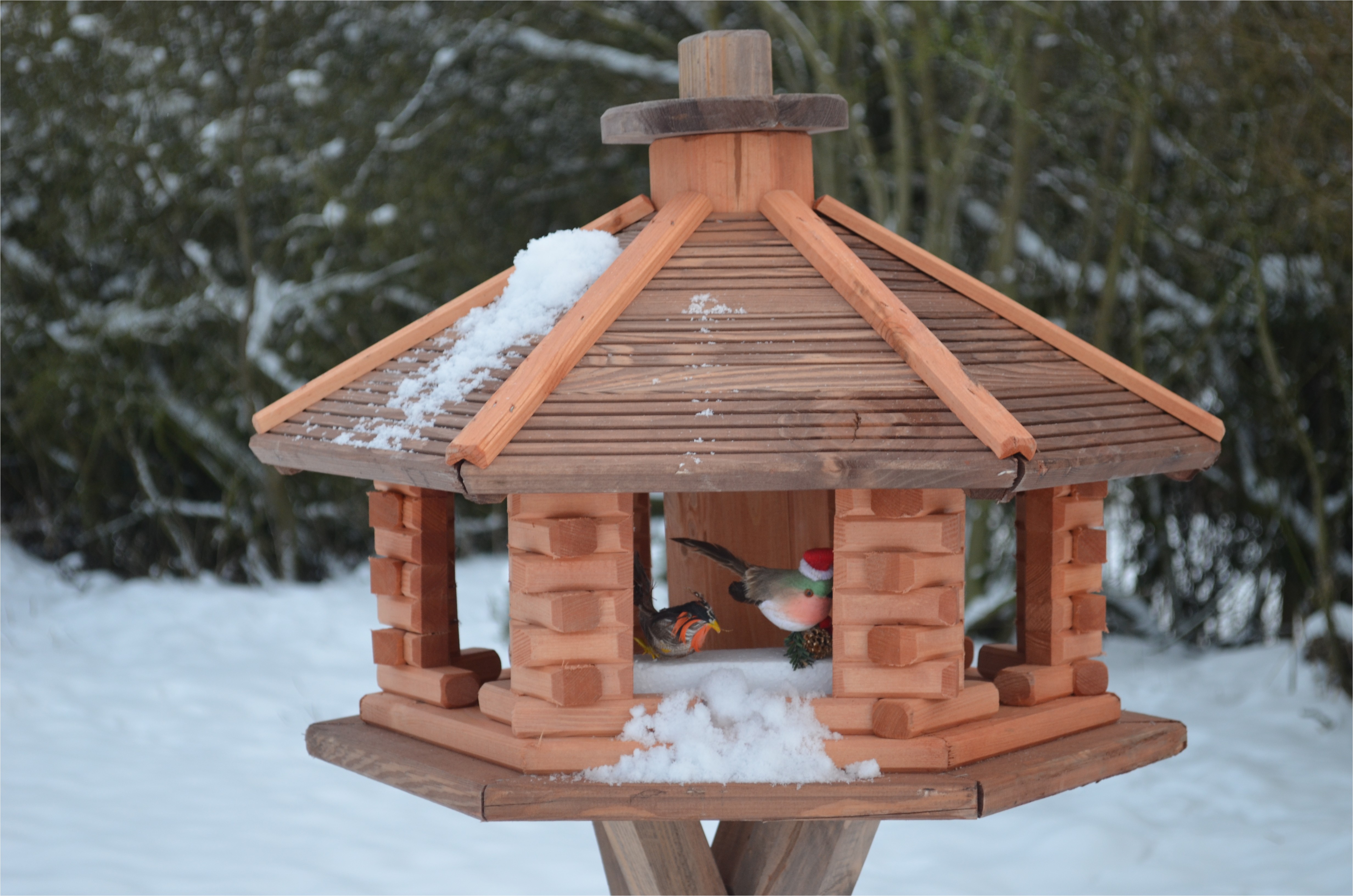 large wooden bird feeder
