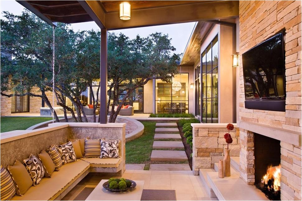 family home with outdoor living room and pool