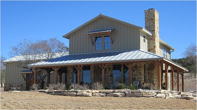 lovely metal ranch home w wrap around porch in texas plan available