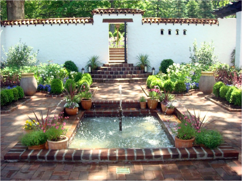 dd108584adcd447b small front courtyards small spanish style courtyard garden