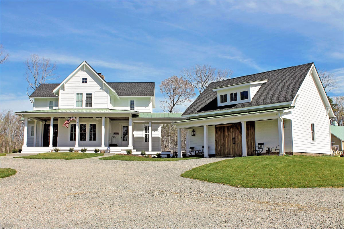 quintessential american farmhouse with detached garage and breezeway 500018vv