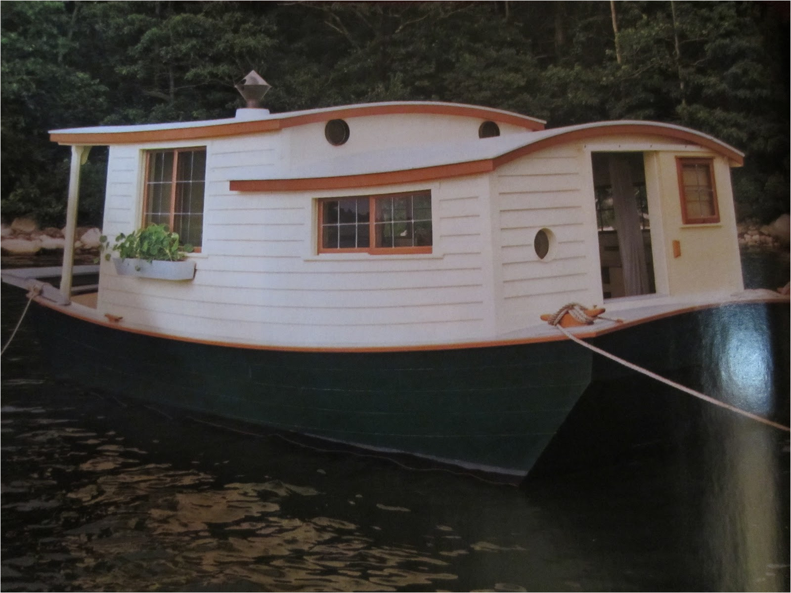 an unbelievable shantyboathouseboat in wooden boat magazine