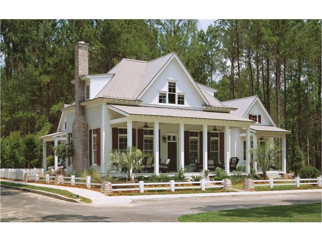 a-white-house-with-black-shutters-and-porches