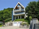 Steep Hillside Home Plans A House On A Slope Connects to Its Surroundings Through A